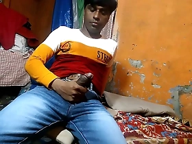 A young country boy with black hair has fun with his cock and fetishistic tendencies in a gay porn video.