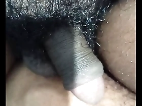 Steamy handjob scene with a hot shemale and a hairy dick ends with a facial.