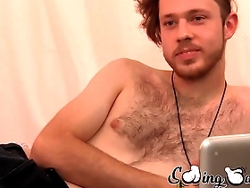 Hairy gay Woody Johnson enjoys cock tugging and a facial finish