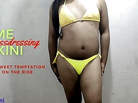 Hot lime Bikini wearing Indian transsexual in solo action.