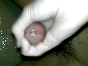 Handjob on a big cock in a gay video