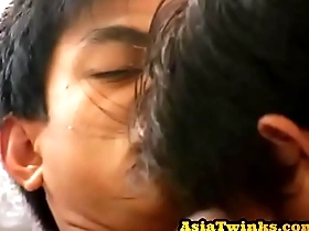 Young Japanese twink gets anal sex after giving blow jobs in gay sex video