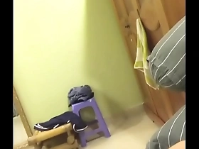Gay Vietnamese man giving blow job to his step brother with an erection.