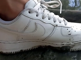 Jon Arteen enjoys playing in the mud with his Nike Air Force One AF1 sneakers on his bare feet. Gay foot fetish boy porn video.