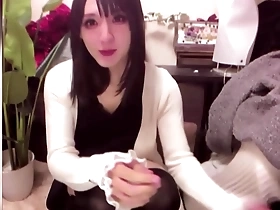 Beautiful Japanese ladyboy masturbates and has great pleasure.