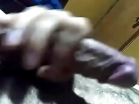 Gay man masturbates to Japanese music.