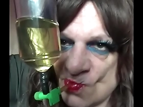 Gay crossdresser Mark Wrights love for piss play continues in this video.