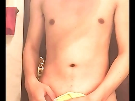 Solo Chinese boy getting ready to shave