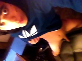 Young Asian boy with emo look and a small penis pleasuring himself on a chair.