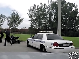 Police officers arrest a black thug gay bike racer and give him a rough anal examination.