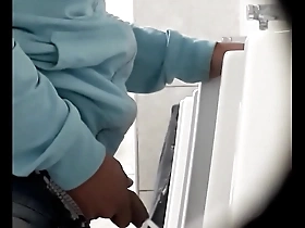 Big dick gay pissing scene in a urinal