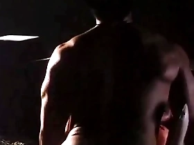 Montys flexing muscles during a gay movie sex scene.