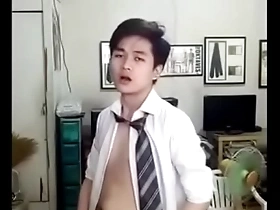 Pretty boy Chinese twink undresses and ejaculates.