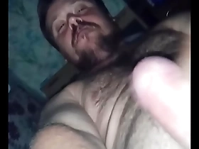 Gay masturbates with a big cock and comes hard