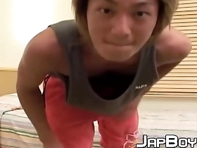 A Japanese hunk with a great ass jerks off his big cock in a rough manner.