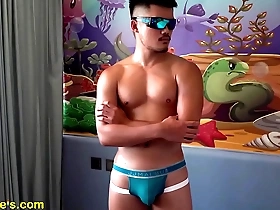 New face dunbar xu flexes and gets massaged and teased.