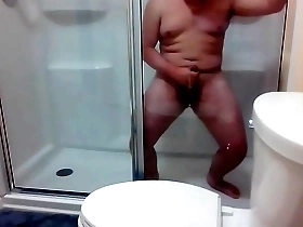 Solo boy enjoys gay sex in hotel shower and gets an anal creampie