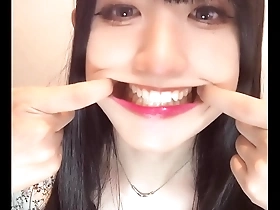 Crossdresser with a tooth fetish masturbates.